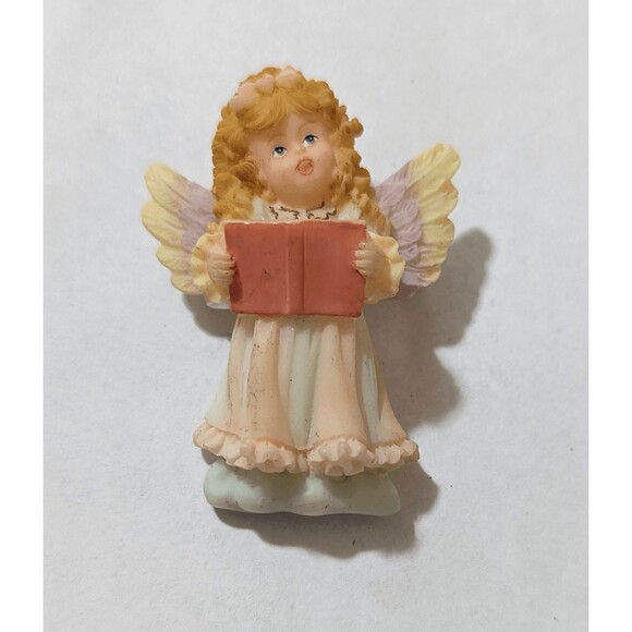 Vintage Jewelry - Vintage 2" caroling angel pin resin holidays brooch